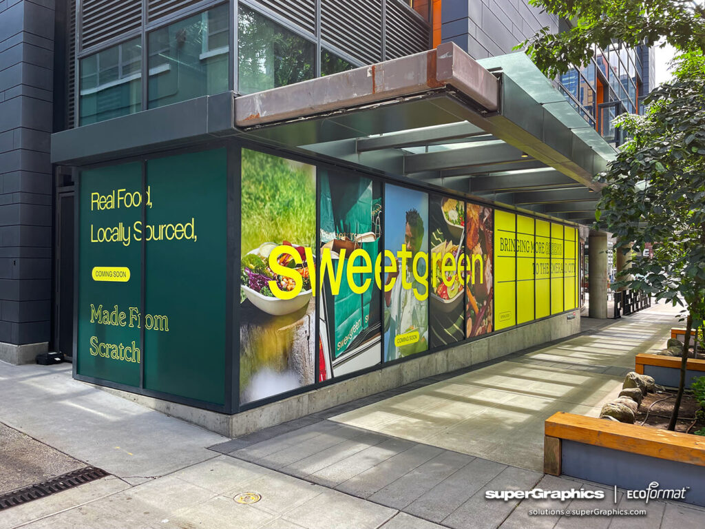 Window graphics for SweetGreen restaurant with 'coming soon' branding completed by SuperGraphics