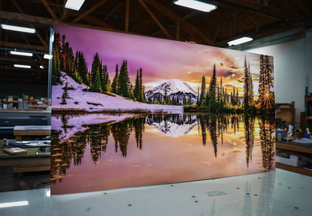 Photo of large metal print with landscape mountain. Project completed by Bumblejax, a company of SuperGraphics.