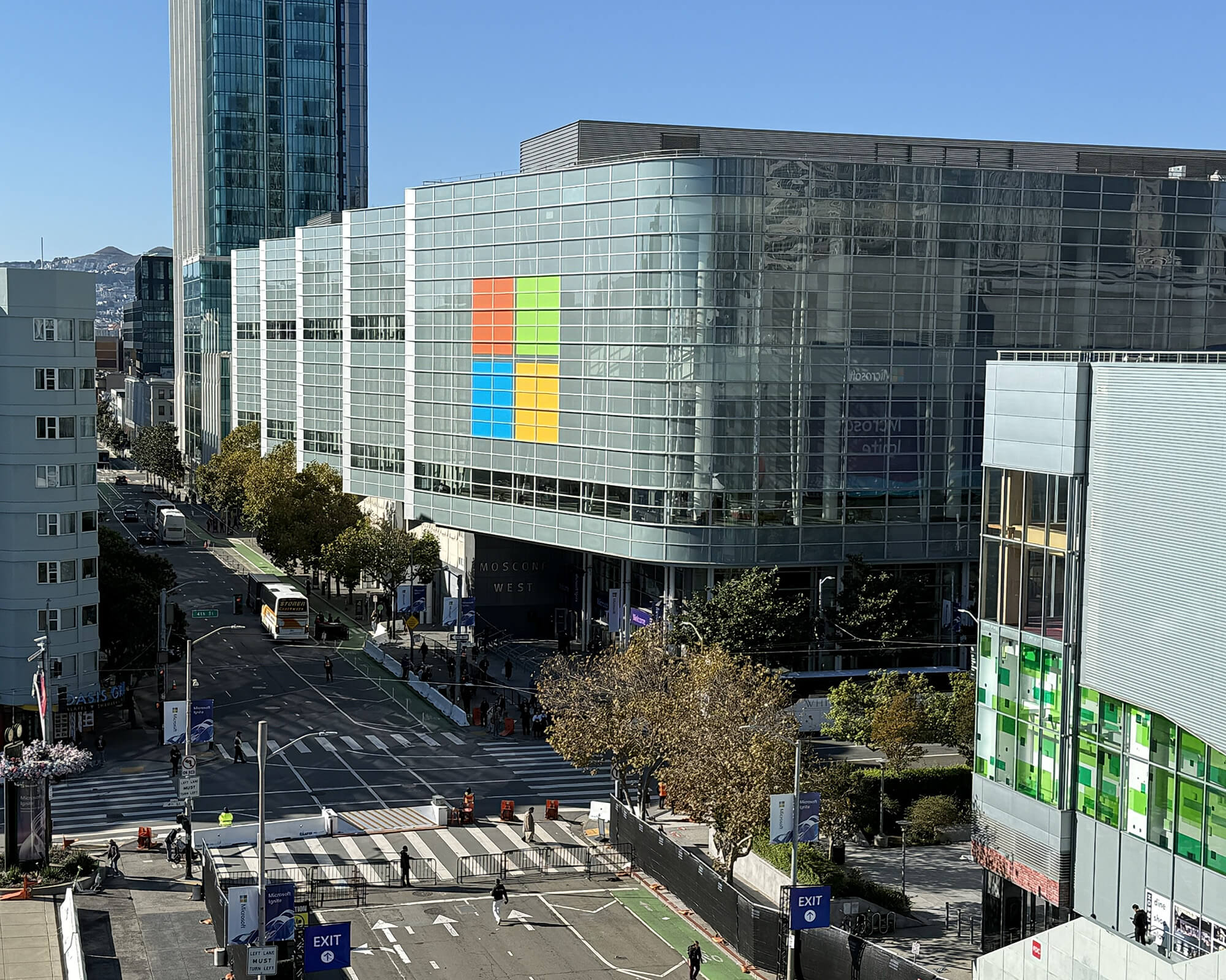 Sustainable large-format Microsoft logo window graphic produced and installed by SuperGraphics on the exterior of Moscone West in San Francisco for Microsoft Ignite.