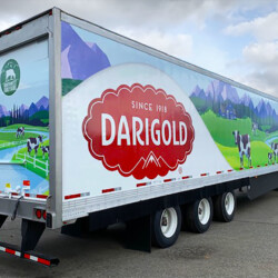 Darigold Truck Wrap with EcoFormat Coating, a clear overprint applied during the production process that is scientifically proven to purify the air. Completed by SuperGraphics.