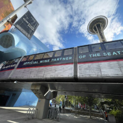 Seattle Kraken Chateau Ste Michelle wrap on Seattle Monorail, completed by SuperGraphics.