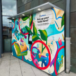 Newly wrapped parcel locker outside the Seattle Public Library Newly wrapped parcel locker outside the Seattle Public Library