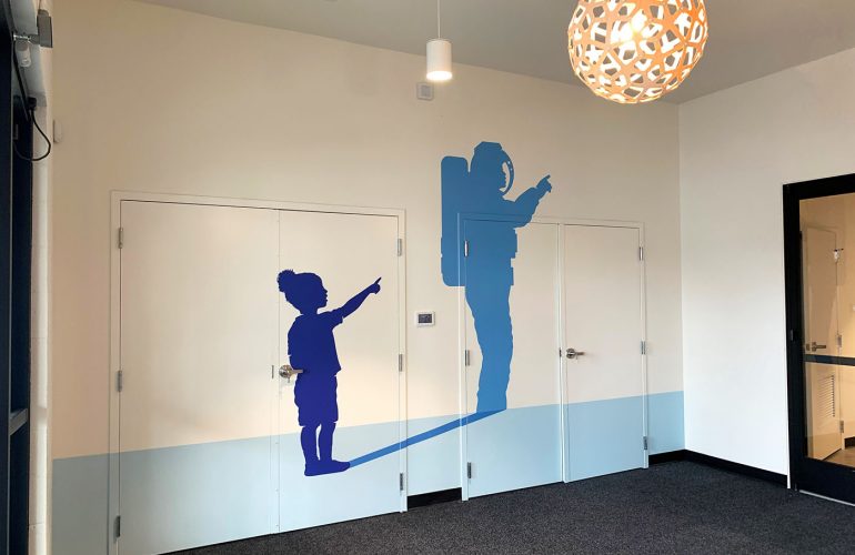 Bezos Academy environmental graphics, completed by SuperGraphics. Includes colorful wall graphics and privacy film.