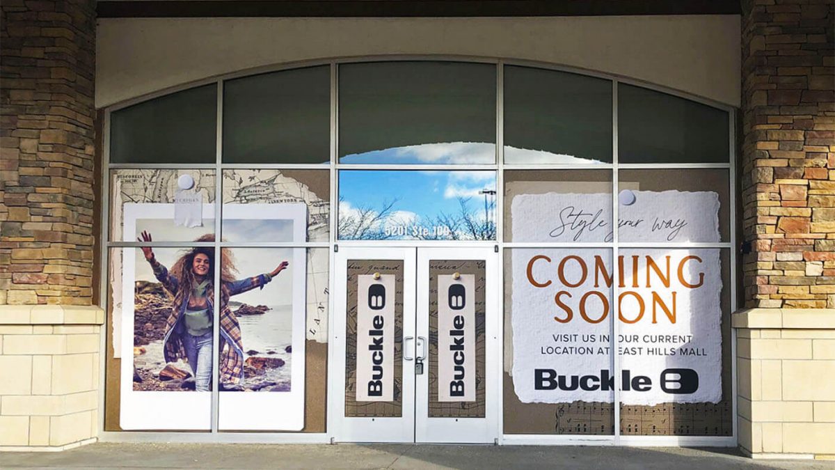Buckle Barricade window graphics announcing store opening, produced and installed by SuperGraphics.