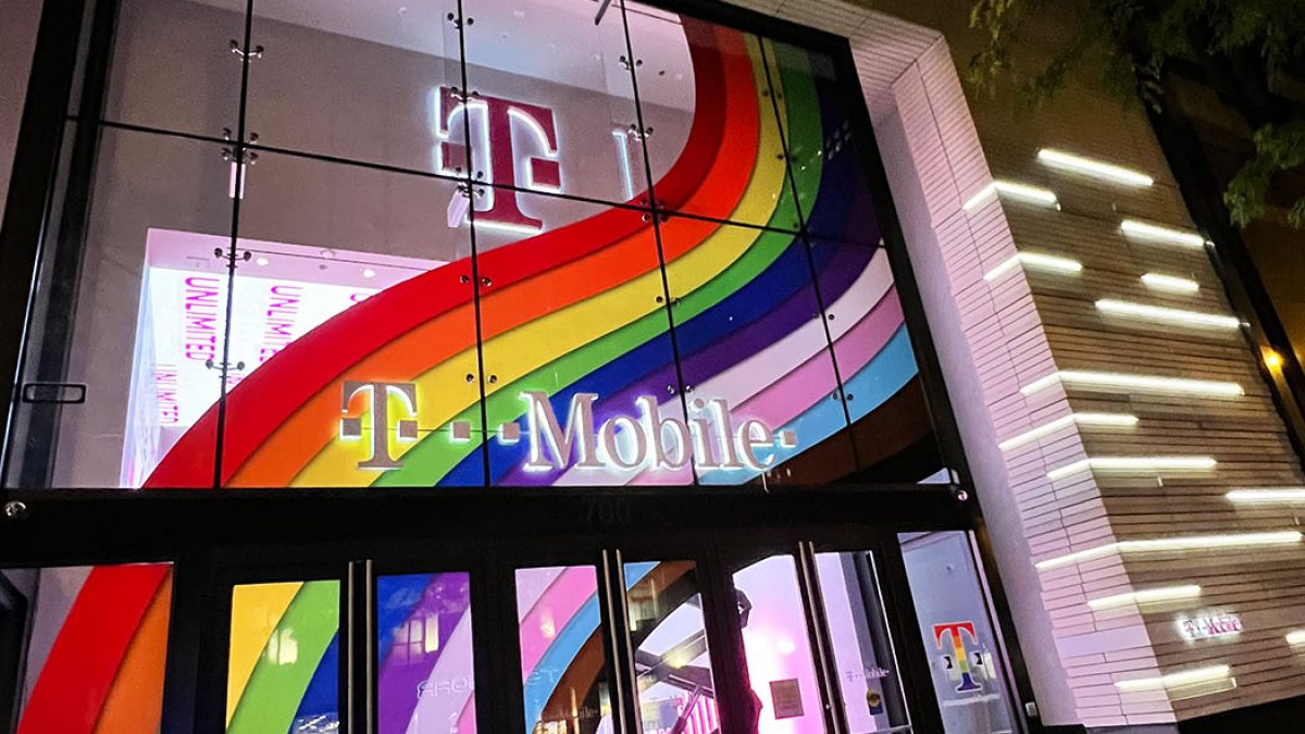 Graphics for T-Mobile Pride campaign 2022, completed by SuperGraphics. Features rainbow window graphics, and rainbow T-Mobile pedestal installation with floor graphics.