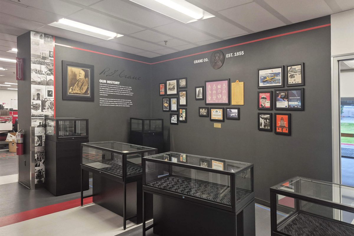 Immersive gallery environment from MoPOP’s Hidden Worlds: The Films of LAIKA featuring dimensional forest elements, character graphics, and exhibit lighting, produced and installed by SuperGraphics.