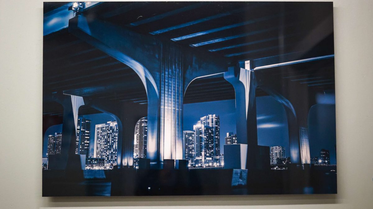 Photo of fine art print showcasing photography of dark cityscape. Fine art printing completed by SuperGraphics.