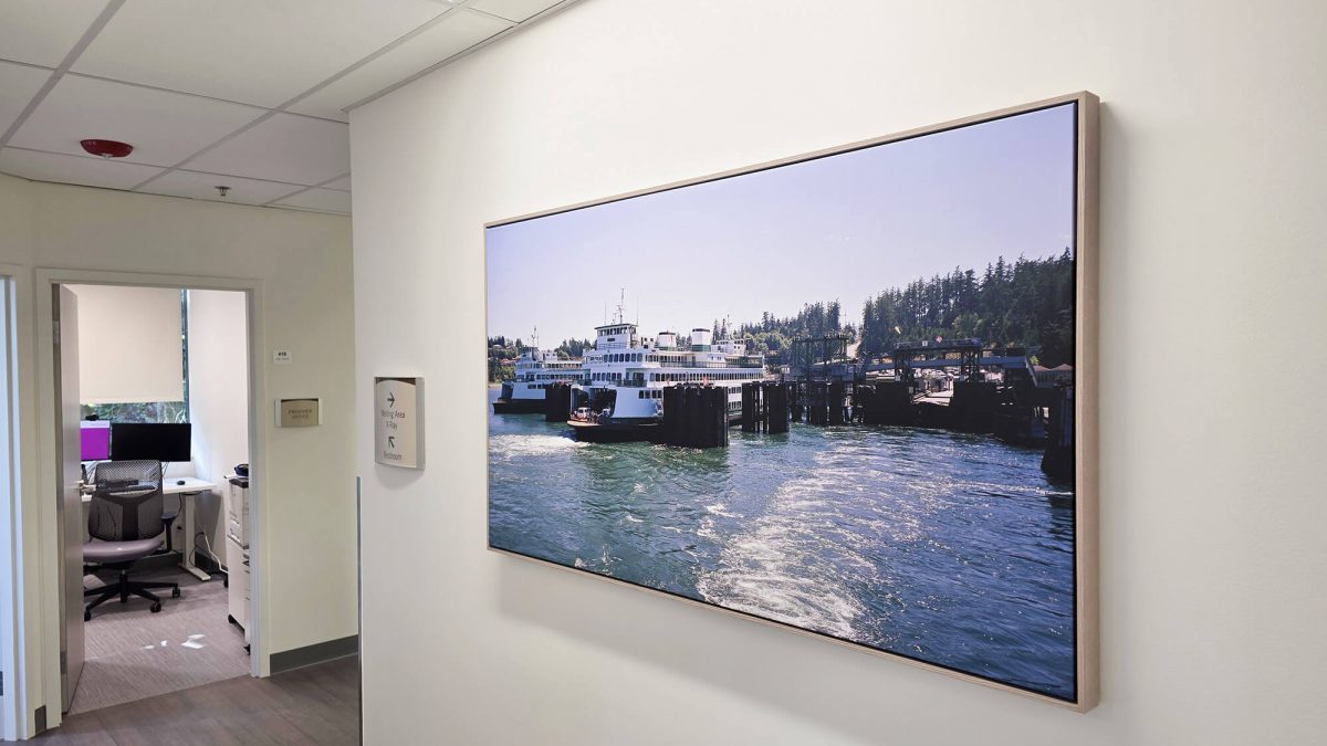 Photo of fine art print for Seattle healthcare facility, showcasing photography of Seattle. Fine art printing completed by SuperGraphics.