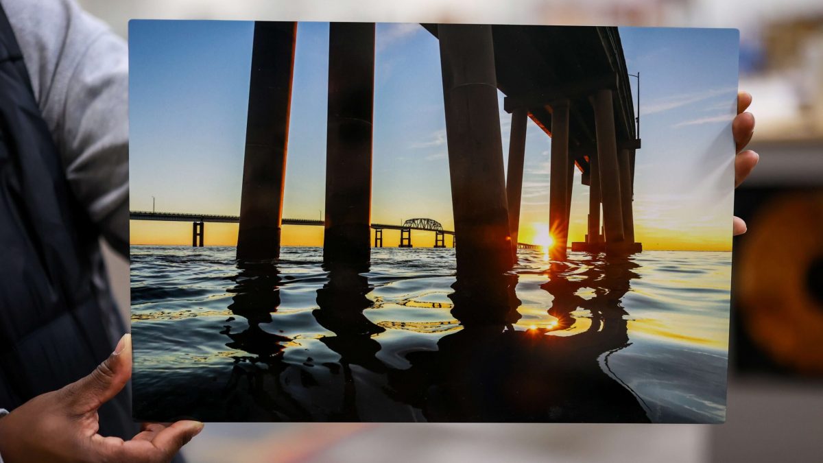 Photo of fine art print showcasing photography of bridge on the water. Fine art printing completed by SuperGraphics.
