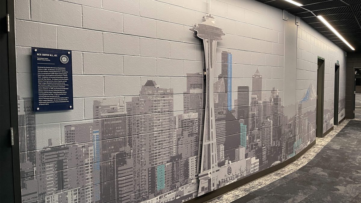 Wall mural for Seattle Mariners Training Facility, showcasing Seattle cityscape. Produced and installed by SuperGraphics.
