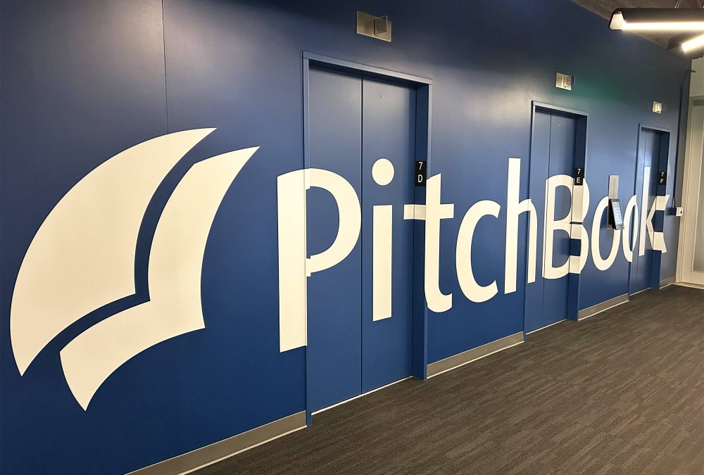 Elevator wall graphic for Pitchbook, produced and installed by SuperGraphics. Showcases Pitchbook logo across multiple elevator doors.
