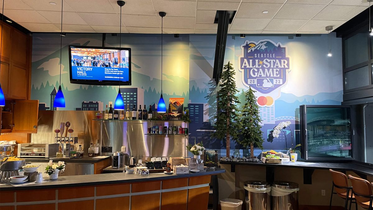 Seattle Mariners All Star Game wall mural, produced and installed by SuperGraphics. Showcases event branding behind concessions wall.