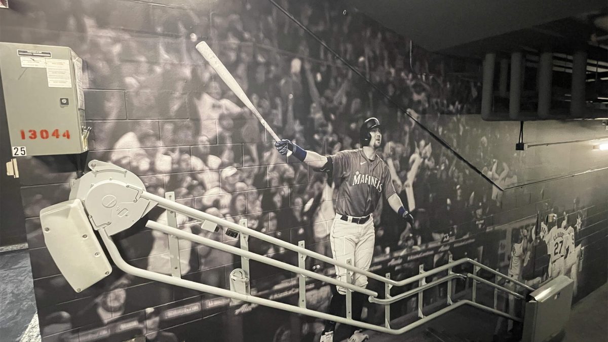 Wall mural for Seattle Mariners Training Facility, showcasing player on field in black and white. Produced and installed by SuperGraphics.