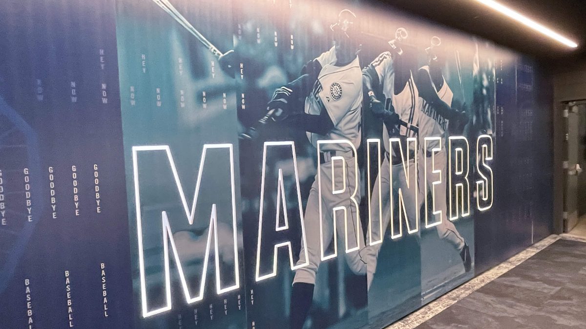 Wall mural for Seattle Mariners Training Facility, showcasing mariners branding and graphic of player. Produced and installed by SuperGraphics.