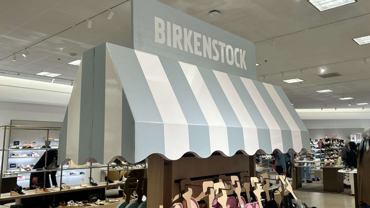 Nordstrom Display signage, produced by SuperGraphics. This EcoFormat Display was engineered from sustainable rigid board material. This display is an umbrella overhang on top of Birkenstock product display.