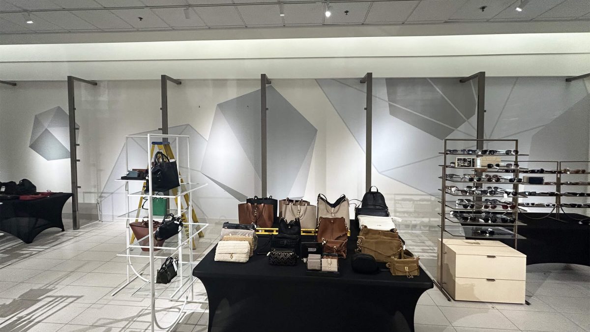 Nordstrom wall mural, completed by SuperGraphics. Showcases shape design along walls of retail space.