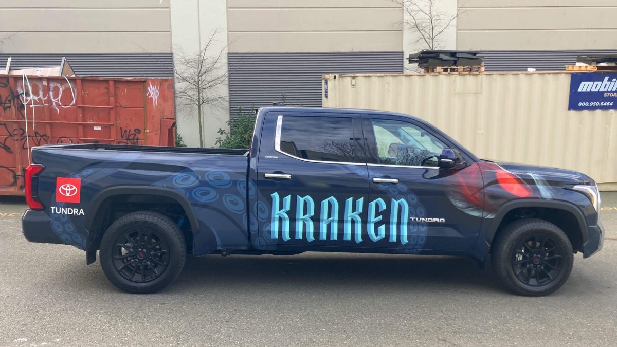 Seattle Kraken fleet wrap, produced and installed by SuperGraphics. Features Kraken graphic branding behind the Kraken team logo.