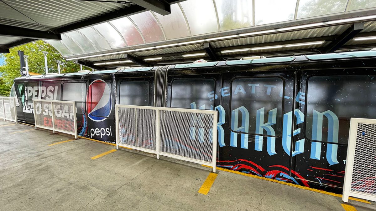 Seattle Kraken Monorail wrap, produced and installed by SuperGraphics. Features sponsorship branding and Kraken logos and branded messaging on Seattle's Monorail.