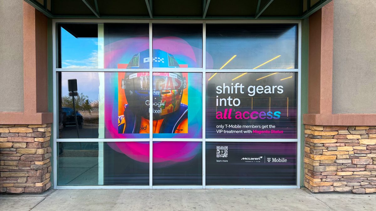 Formula 1-inspired window graphics with text promoting a campaign rollout for retail customers.
