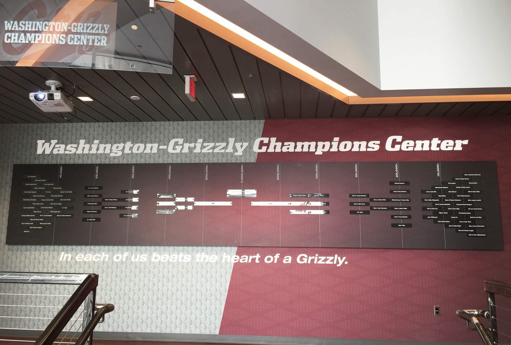 University of Montana Athletics Facility branding, produced and installed by SuperGraphics. Showcases sponsorship and donor signage branded in UM colors.
