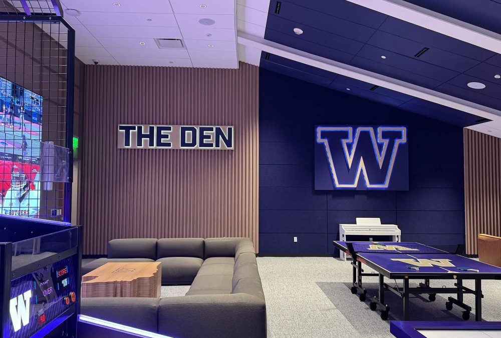 University of Washington Den wall graphics, produced and installed by SuperGraphics. Showcases dimensional signage of W logo and "The Den."