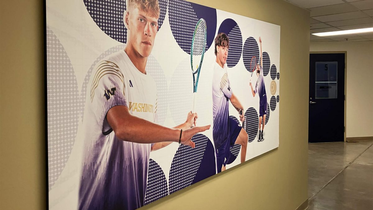 University of Washington printed graphics, produced and installed by SuperGraphics. Features player photography and branded graphics in large wall print.