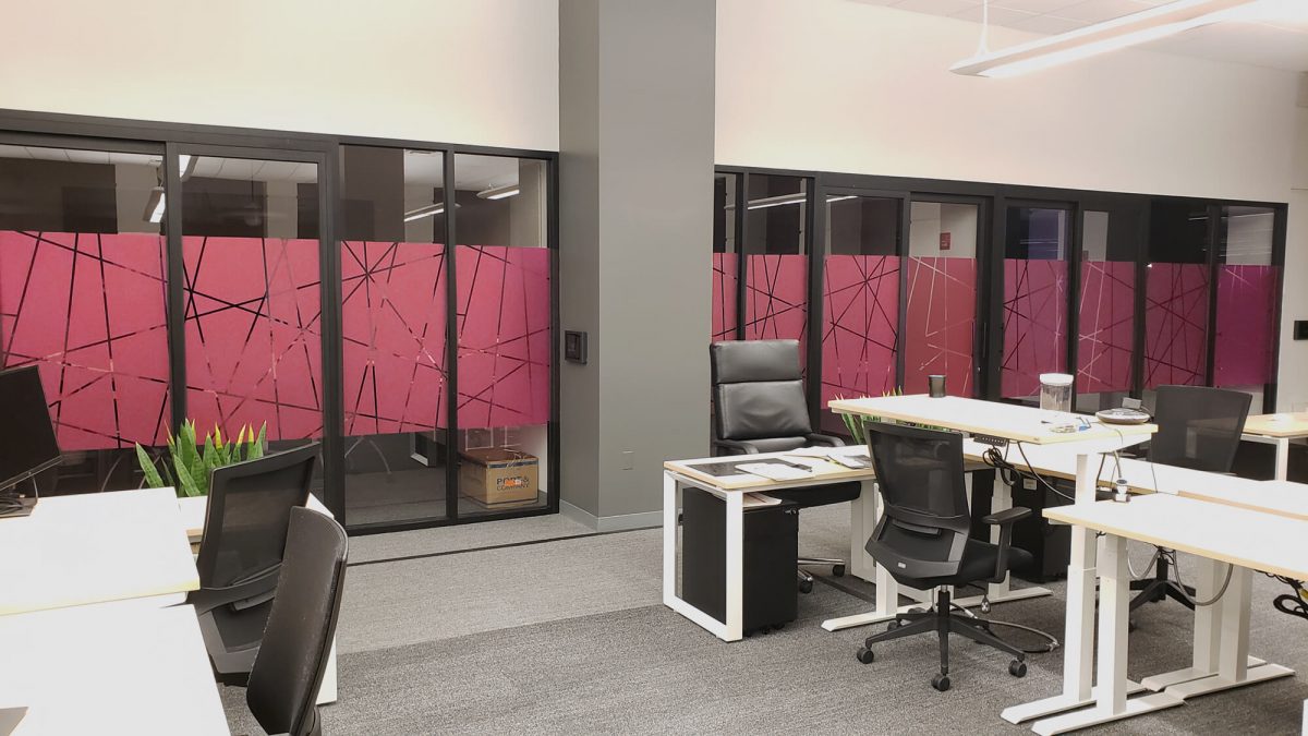 Colored privacy film window graphics for T-Mobile's corporate offices, produced and installed by SuperGraphics.